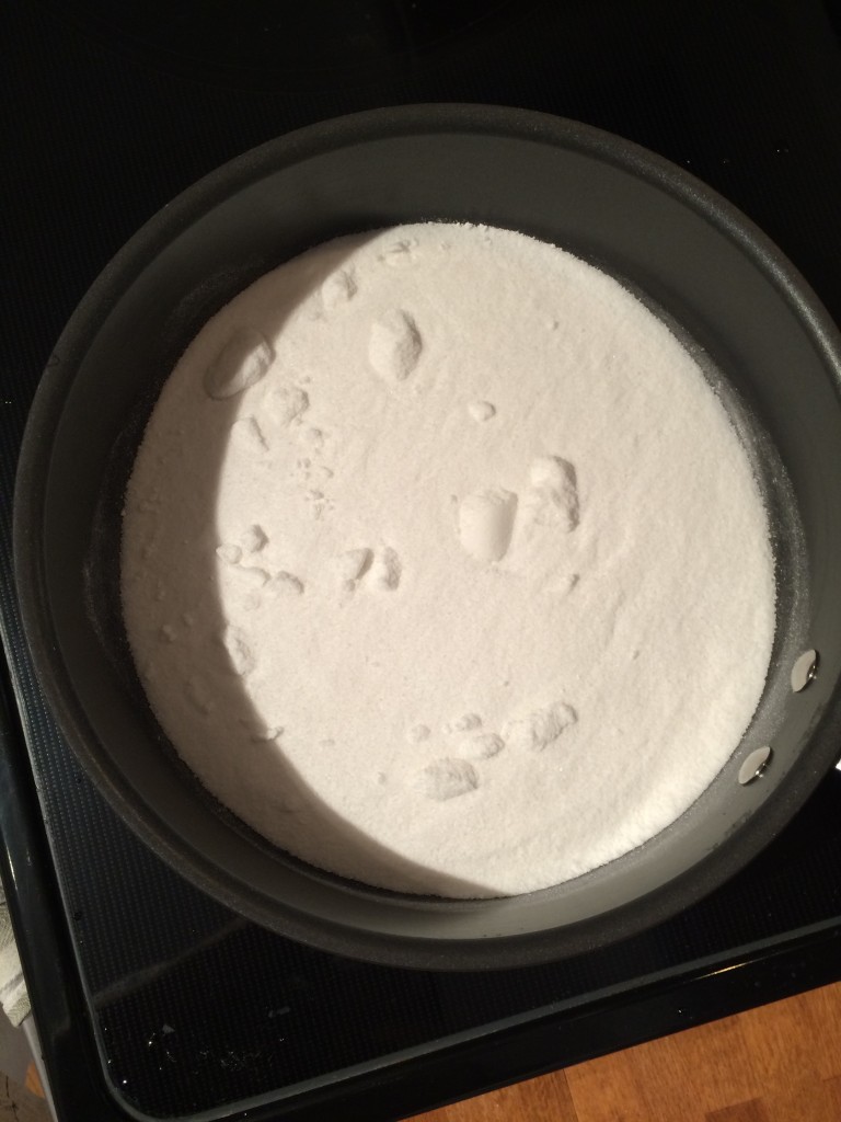 heat the sugar in a saucepan until it looks like...