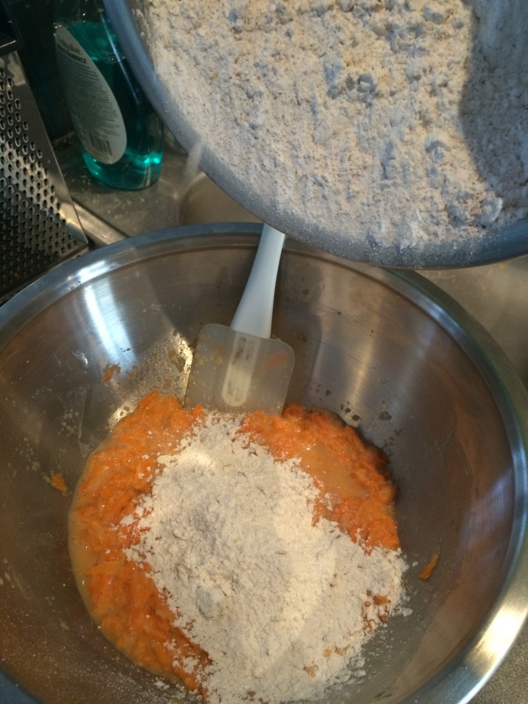 Pour dry ingredients into bowl with wet ingredients 